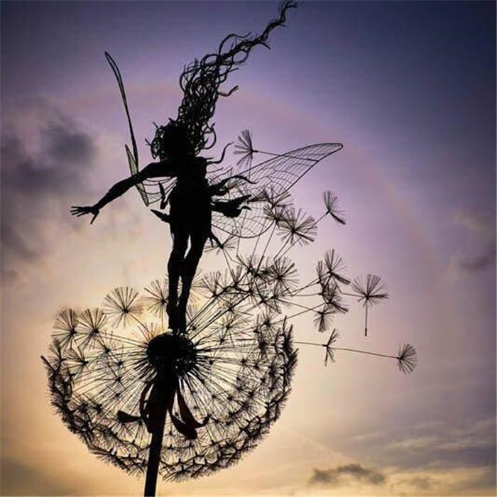 Handcrafted metal garden figures for enchanting accents