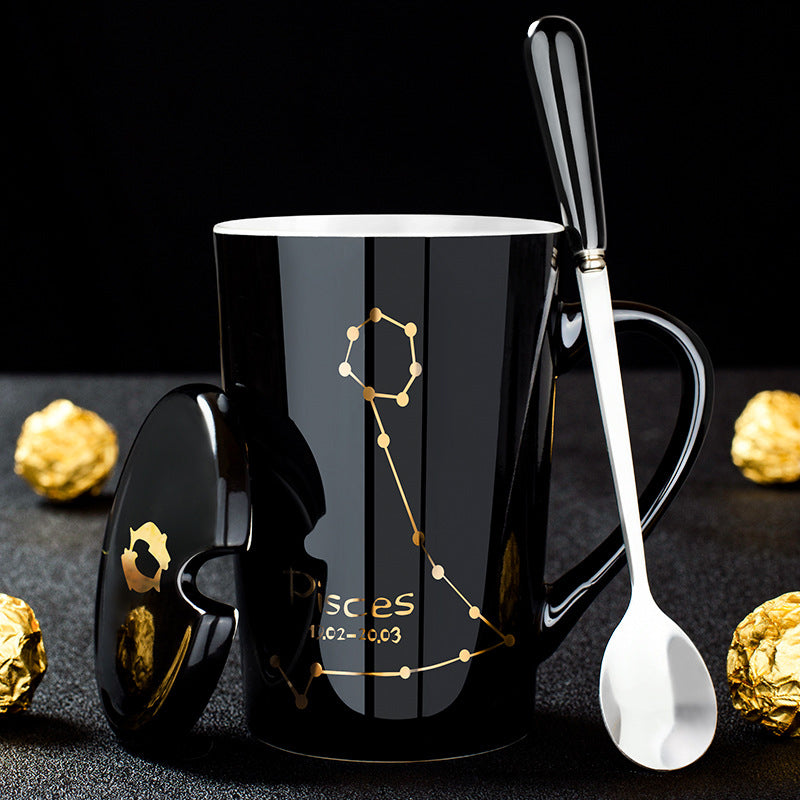 Schwarze Keramiktasse mit Deckel und Löffel – 12 Sternbilder