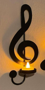 Wandlicht mit schwarzer Musiknote