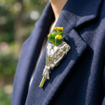 Elegante Brosche mit Mini-Vase für frische Blumen