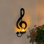 Wandlicht mit schwarzer Musiknote