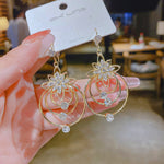 Drei-Ringe Ohrringe mit Kristall-Lotus