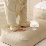 Space-saving, self-compressing storage bag