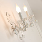 Elegante Wandlampe für Kerzen mit Kristallverzierung in Weiß