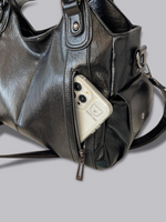 Stylische Handtasche mit mehreren Fächern und abnehmbarem Schultergurt