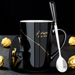 Schwarze Keramiktasse mit Deckel und Löffel – 12 Sternbilder