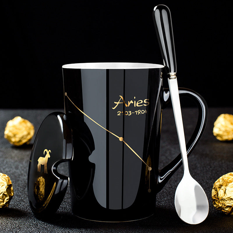 Schwarze Keramiktasse mit Deckel und Löffel – 12 Sternbilder