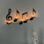 Wandlicht mit schwarzer Musiknote