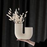 Elegante beige Blumenvase mit einzigartigem Design