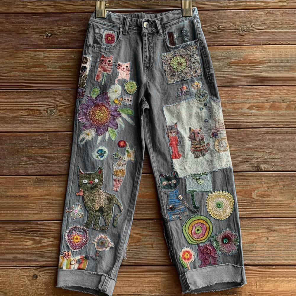 Elegant women's jeans in a bohemian style with a floral motif