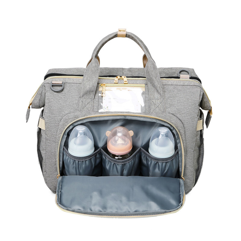 Wickeltasche mit integriertem, tragbarem Babybett – 3-in-1 Lösung