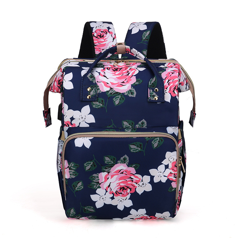 Wickeltasche mit Blumenmuster – Faltbares Moskitonetz für Mütter