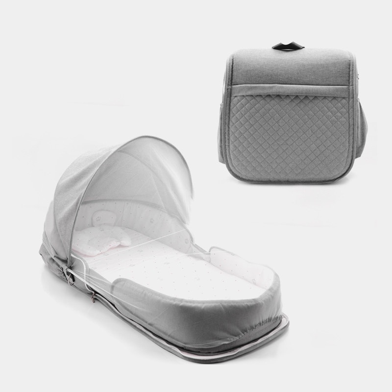 Tragbares 2-in-1 Babybett mit Wickeltasche für Reisen