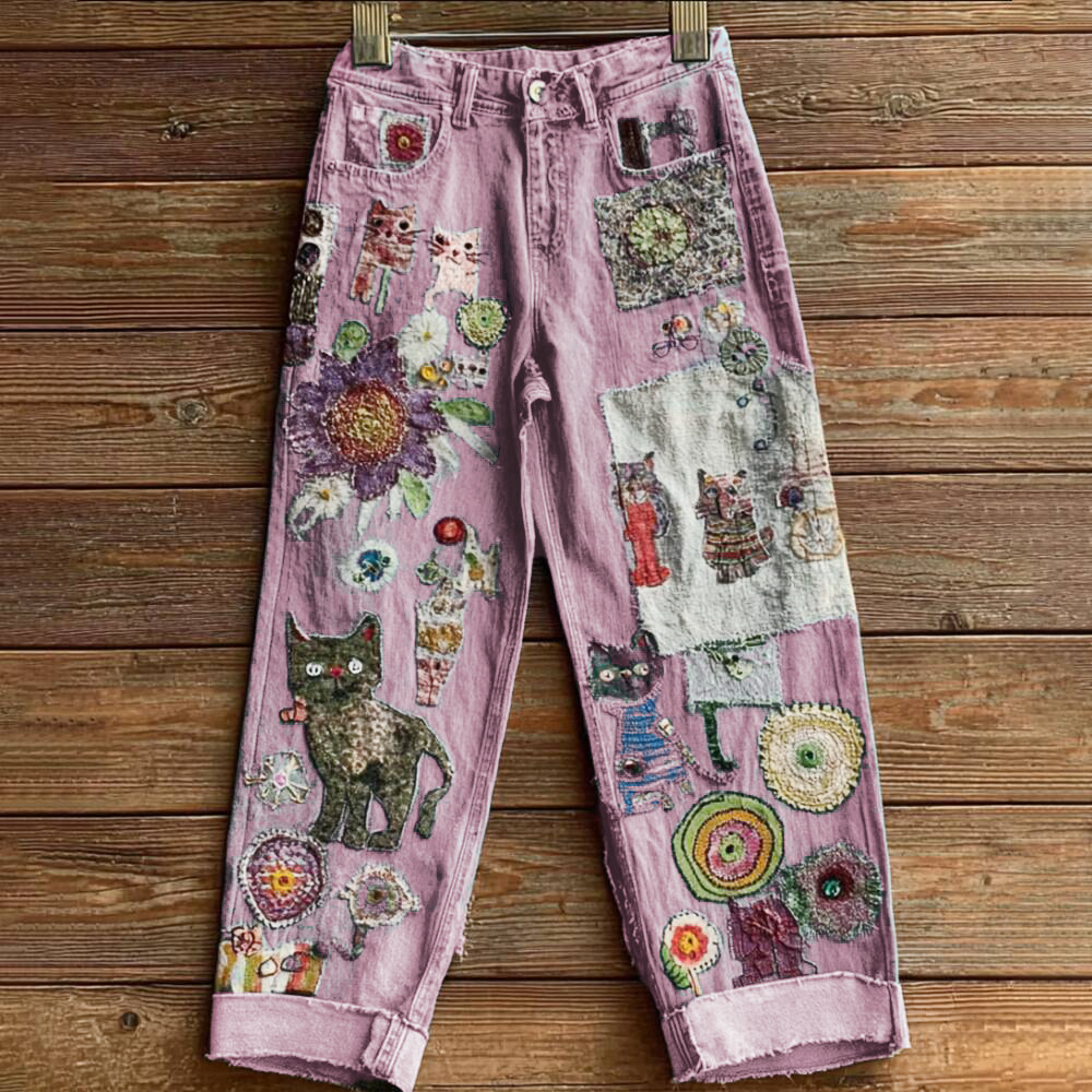 Elegant women's jeans in a bohemian style with a floral motif