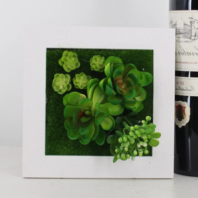 Wanddekoration GreenFrame – 3D Kunstpflanze im modernen Rahmen