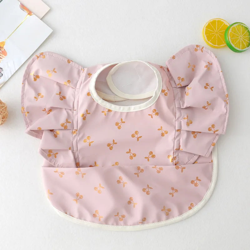 Wasserdichtes Esslätzchen für Babys mit Ärmeln und Auffangtasche