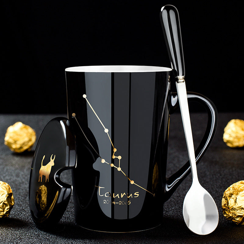 Schwarze Keramiktasse mit Deckel und Löffel – 12 Sternbilder