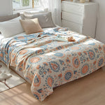 Vielseitige Baumwoll-Decke mit floralen Motiven