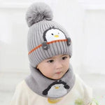 Strickmützen- und Schal-Set für Kinder im Pinguin-Design
