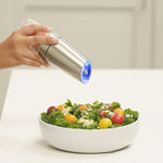 Automatic spice grinder with gravity sensor