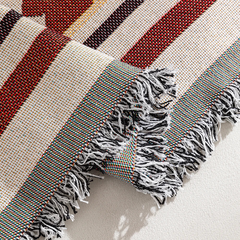 Stylish reversible blanket for a modern living ambience