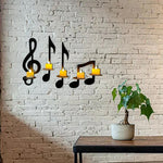 Wandlicht mit schwarzer Musiknote