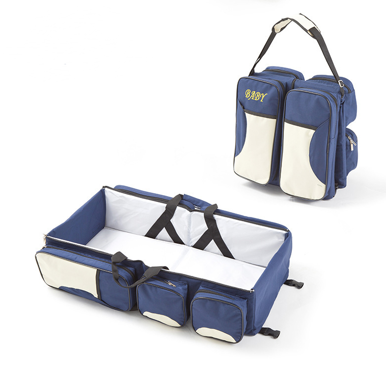 Faltbares Reisebett für Babys mit praktischen Stauraumtaschen
