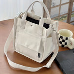 UrbanEase Canvas Umhängetasche – Weiße Schultertasche mit Magnetverschluss und verstellbarem Gurt