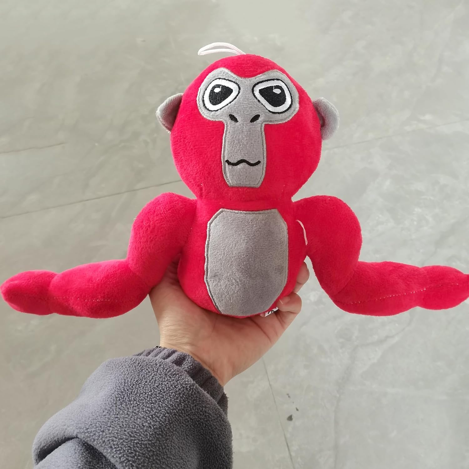 Plüschfigur eines bunten Affen