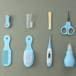 Babypflegeset mit Nagelschneider, Fieberthermometer, Bürste und Kamm