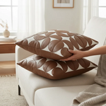Elegant faux leather cushion cover with a modern geometric pattern