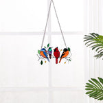 Bunte Glasfensterhänger mit Vogelmotiv