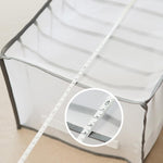 7-Fächer Kleiderschrank Organizer aus Netz für Kleidung