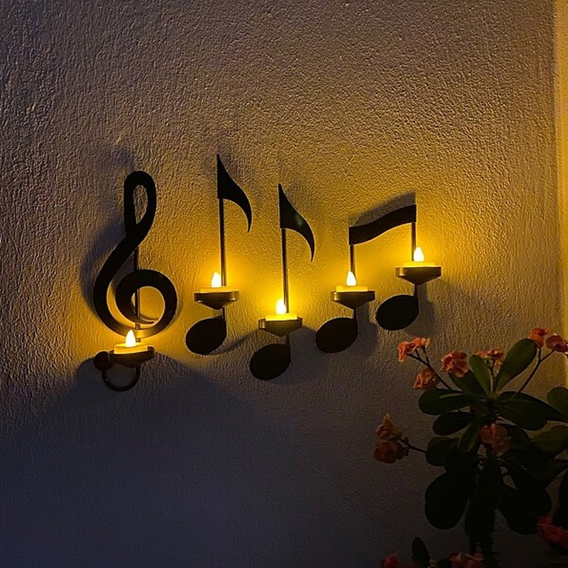 Wandlicht mit schwarzer Musiknote