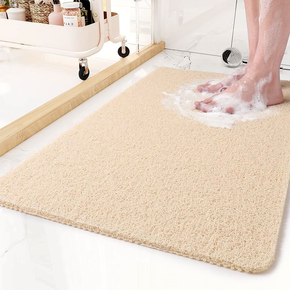Secure and stylish shower mat with clever water drainage