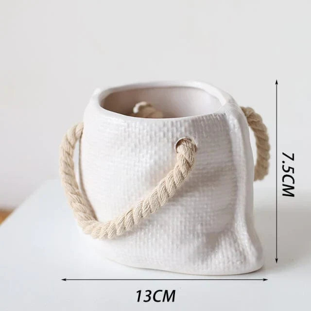 Blumentöpfe in Taschenform für Pflanzen