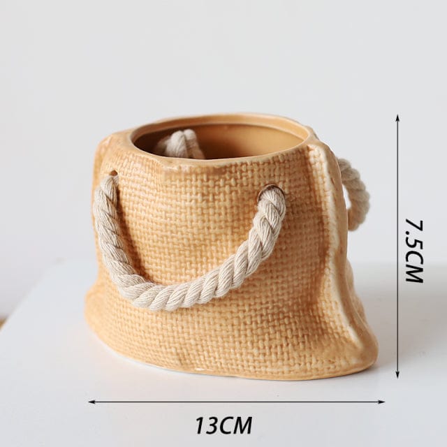 Blumentöpfe in Taschenform für Pflanzen