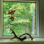 Faszinierender Fensterdekoration mit Monarchfalter aus Glas