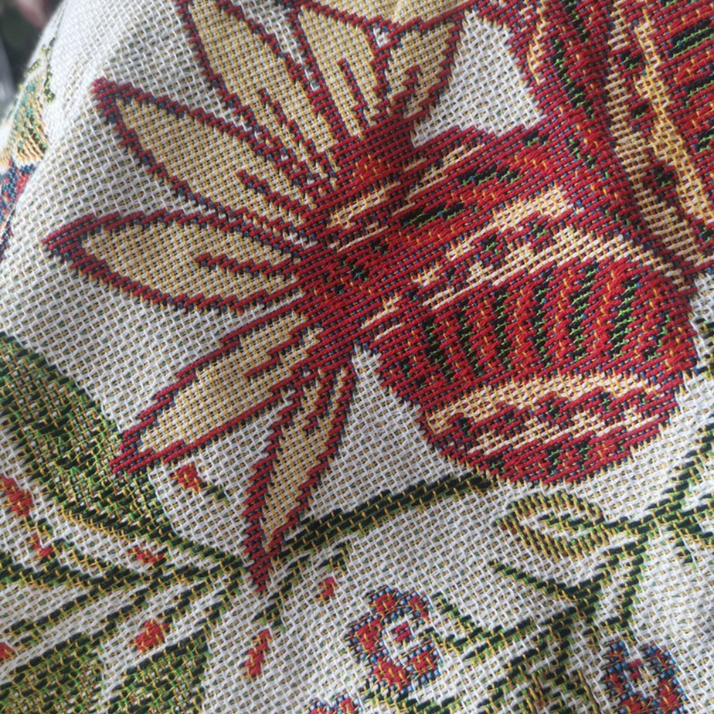 Elegant Blanket with Floral Design and Rustic Fringes