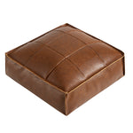 Eleganter Sitzpouf aus Kunstleder mit modernem Gitterdesign