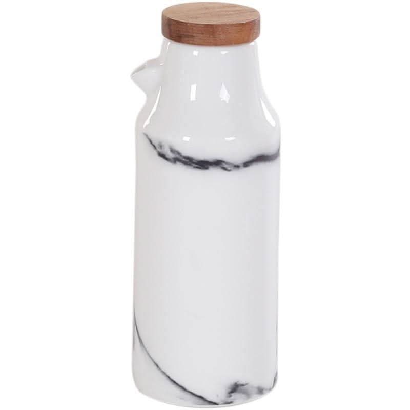 Elegant ceramic kitchen set with spice shakers and oil and vinegar dispensers