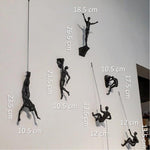 Skulptur des Kletterers