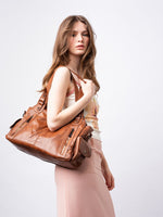 Stylische Handtasche mit mehreren Fächern und abnehmbarem Schultergurt