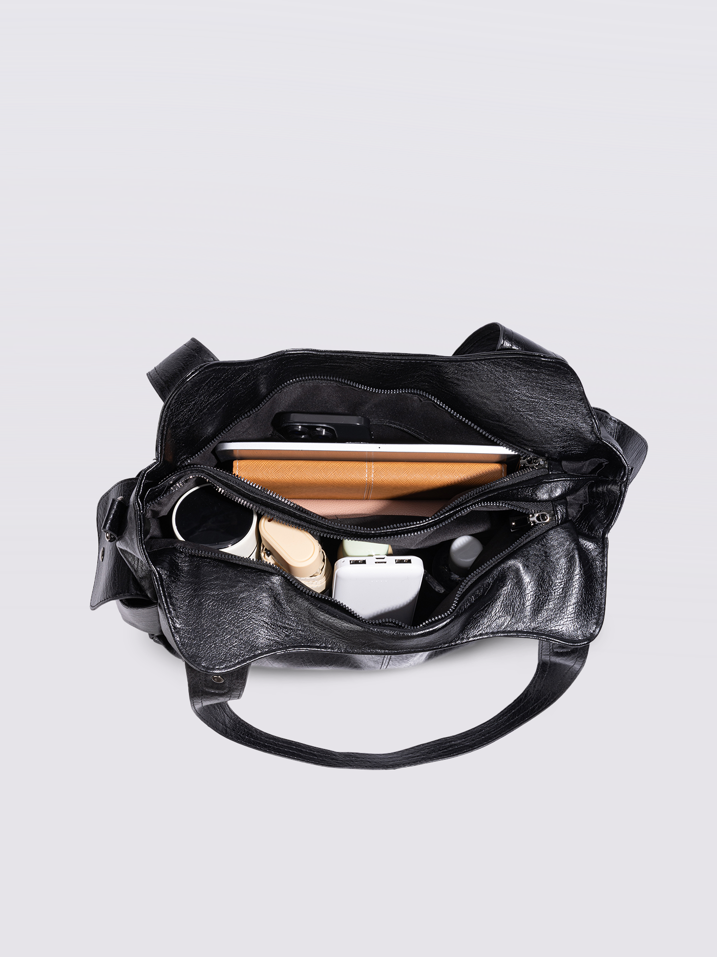 Stylische Handtasche mit mehreren Fächern und abnehmbarem Schultergurt