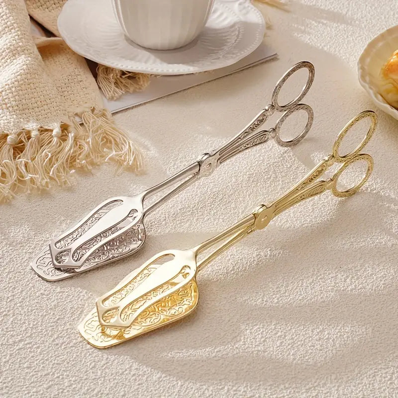 Stylish stainless steel server with vintage engravings
