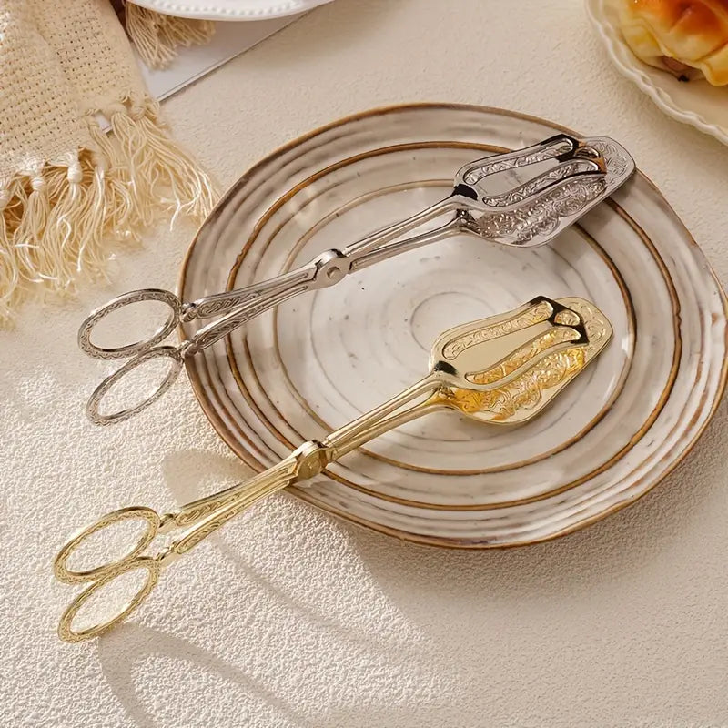 Stylish stainless steel server with vintage engravings