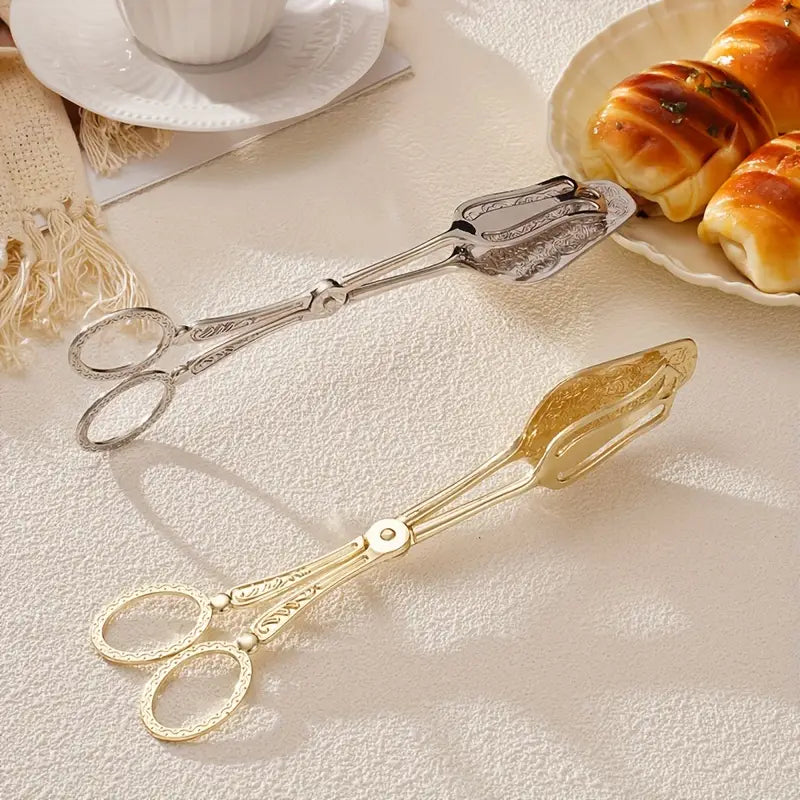 Stylish stainless steel server with vintage engravings