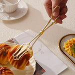 Stylish stainless steel server with vintage engravings