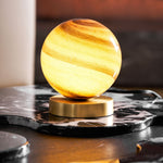 Stylish table lamp with marble sphere and brass base – Perfect lighting for bedroom and desk