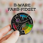 Farbspiel Fidget | Drehbarer Emaille-Anstecker | Kreatives Design